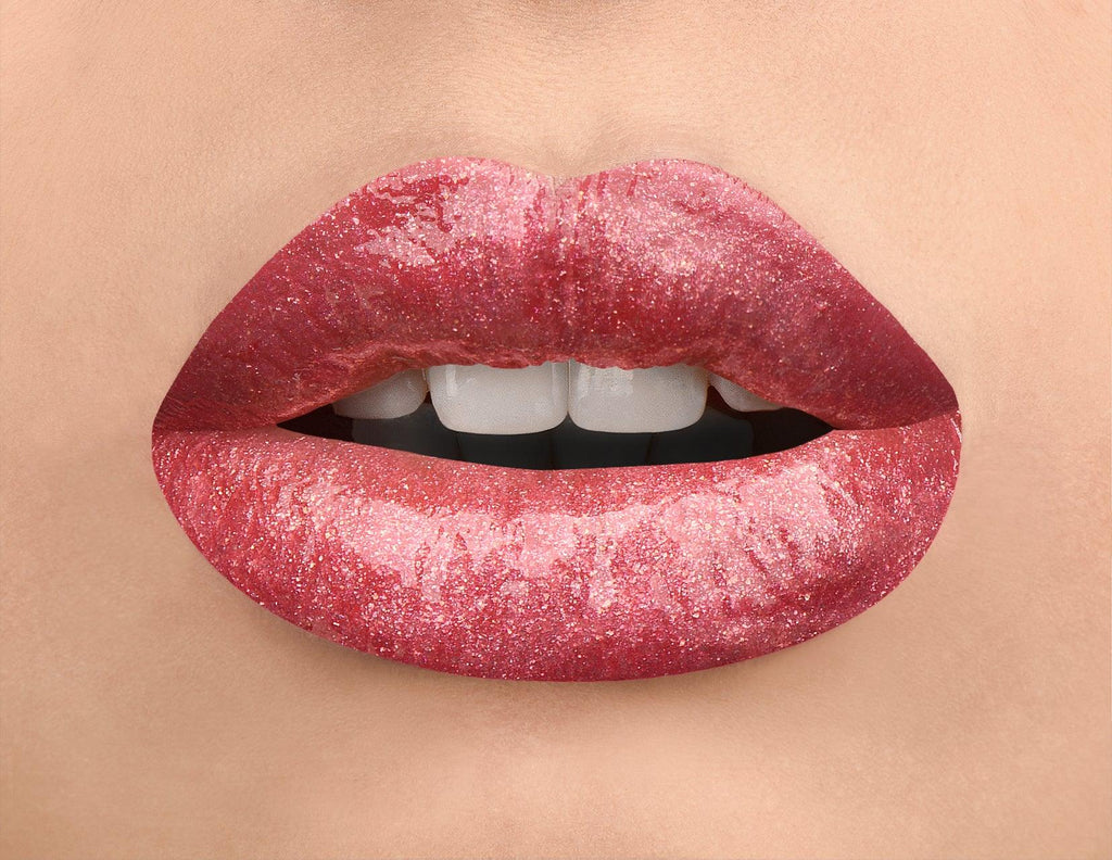 Gorgeous coral lips with a pop of pink shimmer? Yes, please! With its full coverage coral base and thin silver pink shimmers, Plum Pretty's High Shine Lip Strobes give you luscious lips that will turn heads. Trust us - this is one lip product you don't want to miss.