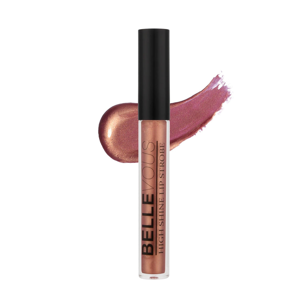 Feeling fancy? Toast up with this high shine lip strobe is the perfect topper for champagne-inspired looks. With a sheer, prismatic bronze tint and rose gold reflections, this lip gloss will help you achieve that elevated look. Wear it alone for a natural glow or layer it over your favorite lipstick for an instant pop of color.